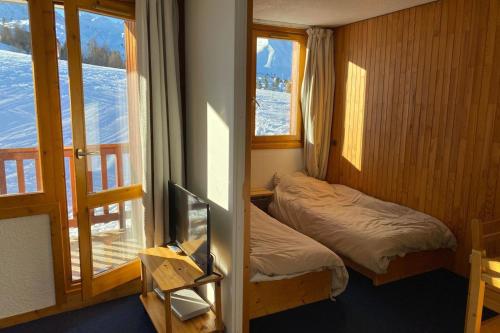 Postel nebo postele na pokoji v ubytování Studio with balcony in Plagne Village