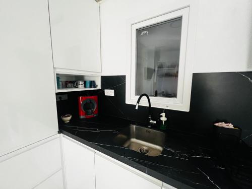 Køkken eller tekøkken på Piso en zona tranquila de - Torrequebrada Golf