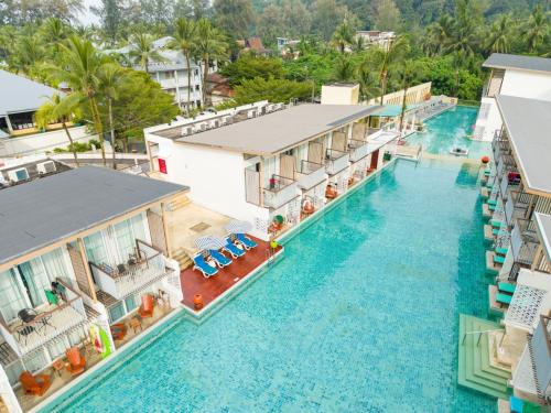 an aerial view of the pool at a resort at The Briza Beach Resort, Khao Lak SHA Extra Plus in Khao Lak