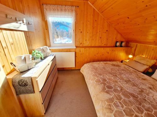 En eller flere senge i et værelse på Apartmán Javorina