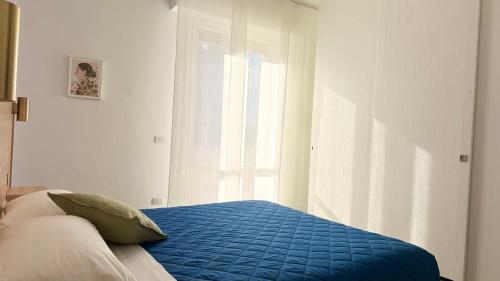 Katil atau katil-katil dalam bilik di Appartamento Lorenzo