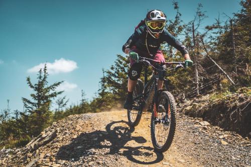 a person riding a bike on a dirt trail at XYZ eXtreme You Zen in Szczyrk