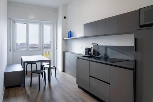 Kuchyň nebo kuchyňský kout v ubytování Panorama View Luxury Appartment