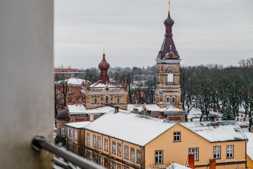 a view of a city with a clock tower at Pärnu Hotel in Pärnu