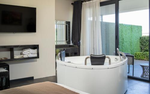 TV a/nebo společenská místnost v ubytování La Cielo Hotel Bostancı