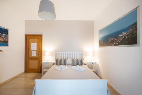 Letto o letti in una camera di Panoramic Rooms Salerno