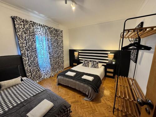 a bedroom with a bed at Apolónia 3 Frontal River View in Lisbon
