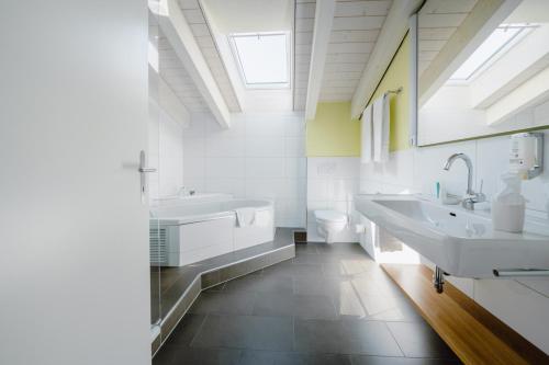 Vannituba majutusasutuses Solbadhotel Sigriswil