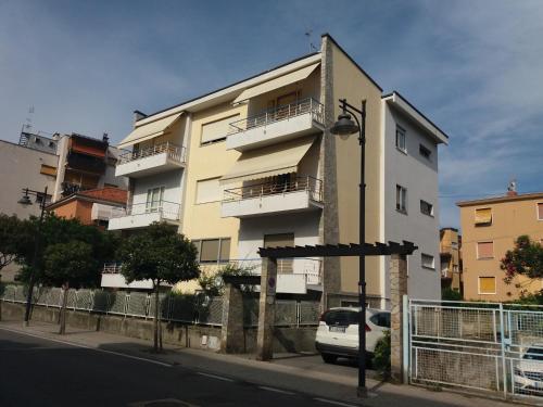 a white car parked in front of a building at Ca' di Do in Albissola Marina