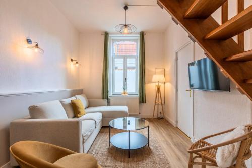 O zonă de relaxare la Maison 3 chambres avec jardin, proche tram