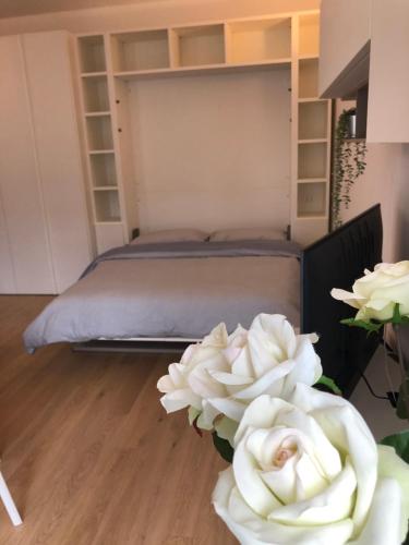 A bed or beds in a room at Music House - Carozzi Apartments