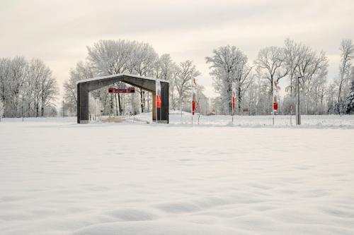 a snow covered field with at Hotel am Haslinger Hof in Bad Füssing