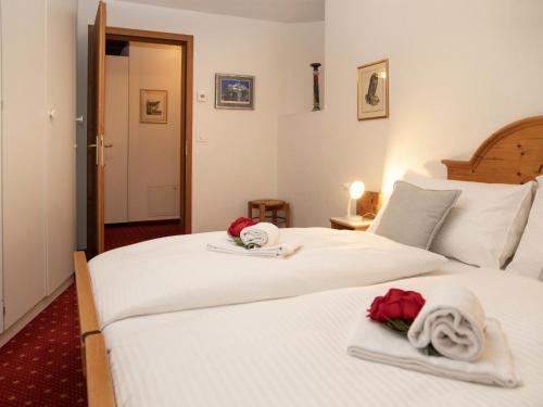 Postel nebo postele na pokoji v ubytování Apartment Chalet Abendrot apARTments-24 by Interhome