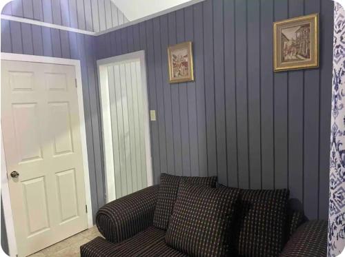 Ein Sitzbereich in der Unterkunft The Grayden Cottage