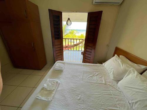 En eller flere senge i et værelse på Casa a Beira Mar