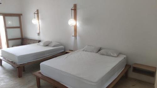 Katil atau katil-katil dalam bilik di Cabañas Casa Fany
