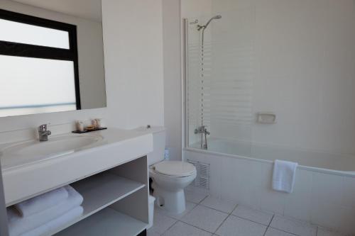 Koupelna v ubytování Tempo Rent Apart Hotel