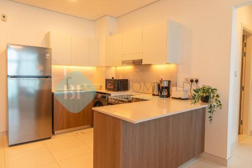 Kuchyň nebo kuchyňský kout v ubytování Bloomfields Modern 1br In Thalassa Beach Front