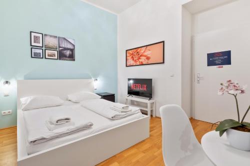 Posteľ alebo postele v izbe v ubytovaní 522 Mbits Wifi Air Con Free Parking