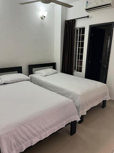 Postel nebo postele na pokoji v ubytování Hotel Cangrejalito