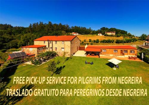 an aerial view of a farm withfree pick up service for pigs from me at A Casa do Folgo Turismo Rural in Negreira