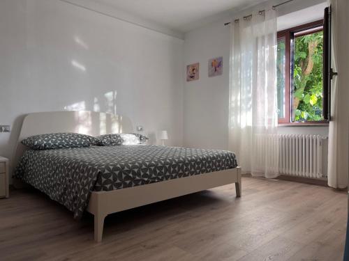 Ένα ή περισσότερα κρεβάτια σε δωμάτιο στο Casa Orlandina