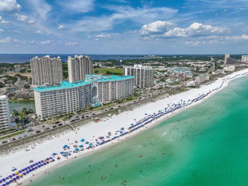 an aerial view of a beach with buildings and umbrellas at Majestic Sun A311 Your Place in the Sun! in Destin