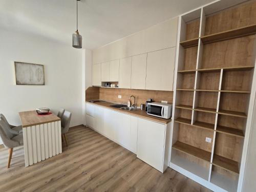 Η κουζίνα ή μικρή κουζίνα στο Porat Apartmani