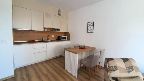Η κουζίνα ή μικρή κουζίνα στο Porat Apartmani