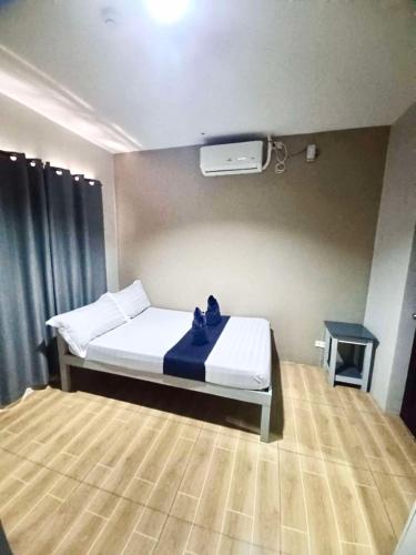 Postel nebo postele na pokoji v ubytování 2020 Travelers Inn