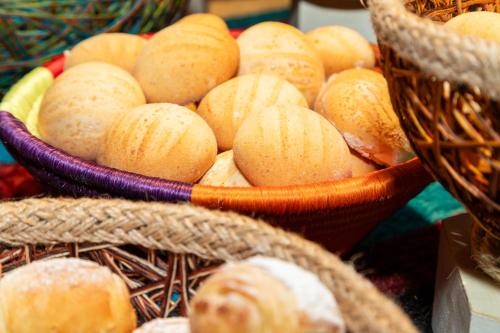 a bunch of baskets filled with balls of bread at Sonesta Hotel Bogotá in Bogotá