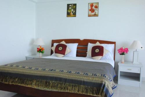 מיטה או מיטות בחדר ב-VIP Condochain Rayong