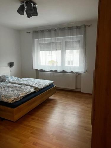 Ένα ή περισσότερα κρεβάτια σε δωμάτιο στο Feel Home