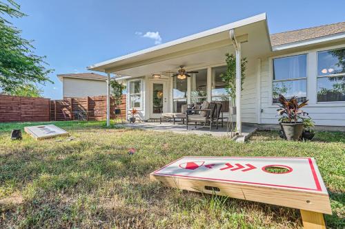 a house with avertisementatronatronstrationstrationstrationstrationstrationstrationstrationstrationstration at Cozy Family Retreat - Pet Friendly in Pflugerville
