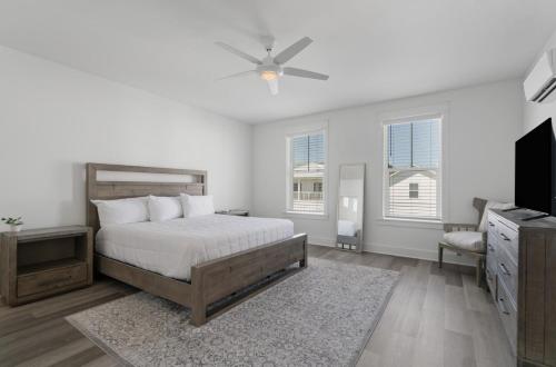 Voodi või voodid majutusasutuse The Richest Peasant at Inlet Beach toas