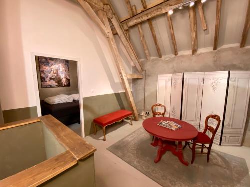Ruang duduk di Domaine Lavau - Gîte L'Artisane