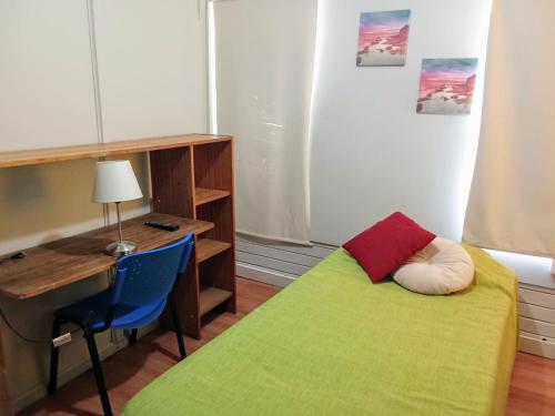 Postel nebo postele na pokoji v ubytování Residencial HITAPUHAN