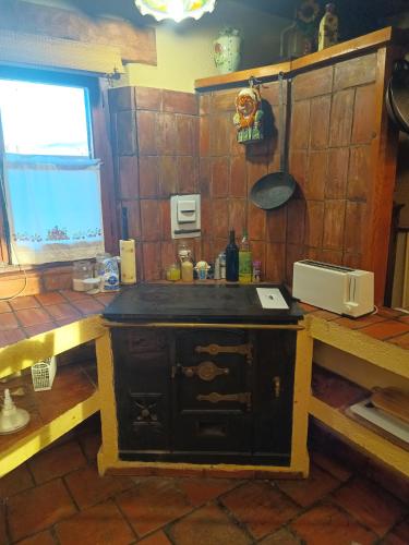 a kitchen with a sink and a counter top at La cerca de la Mata, decerca in Arcones