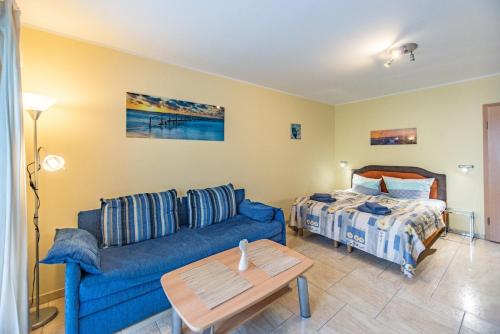 En eller flere senge i et værelse på Ferienwohnung Sonnenschein