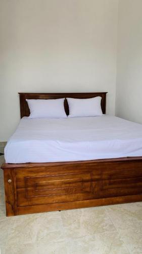 Ένα ή περισσότερα κρεβάτια σε δωμάτιο στο Apartment in Makumbura near Highway Entrance