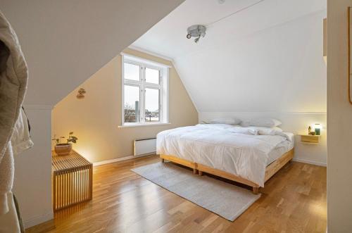 Ένα ή περισσότερα κρεβάτια σε δωμάτιο στο Apartment near Bergen Sentrum for up to 8 people