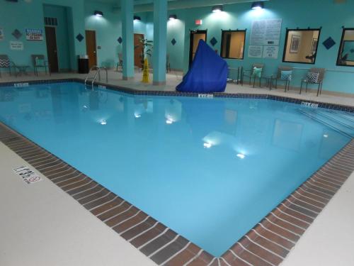a large swimming pool with blue water at Holiday Inn Carbondale - Conference Center by IHG in Carbondale