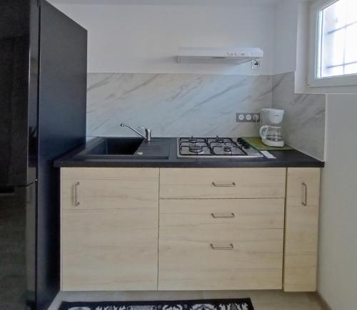 Η κουζίνα ή μικρή κουζίνα στο Studio l'Obrador 25 m2 - Cuisine & terrasse - accès piscine