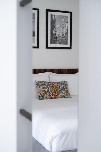 Postel nebo postele na pokoji v ubytování Il Pumo - Apulian Rooms Bari Marchese