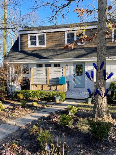 a house with a tree in front of it at 10 Braddock Somers Point in Somers Point