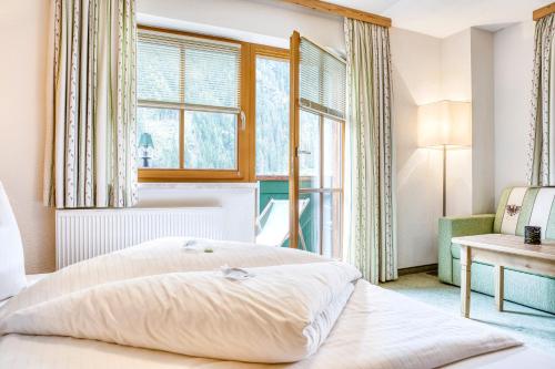 Hotel Edelweiß-Schlösslにあるベッド