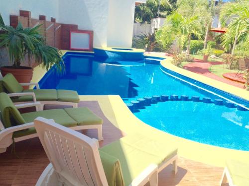 Piscina en o cerca de Hotel y Suites Los Encantos
