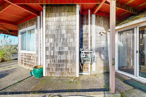 a house with a front door and a window at Carousel House in Pacific City in Pacific City