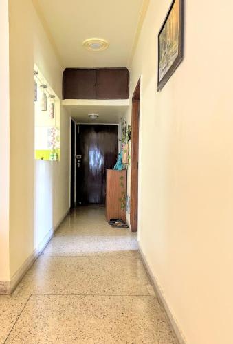 a hallway of a home with a hallway at Pearl of Nature By Nyra in New Delhi