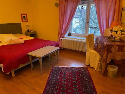 Postel nebo postele na pokoji v ubytování Les vrilles